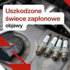 Cztery zużyte świece zapłonowe leżą na silniku. Dowiedz się, kiedy wymiana świec zapłonowych jest konieczna i jakie są objawy ich uszkodzenia.