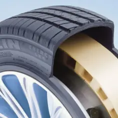 Przekrój opony Michelin z żółtym wzmocnieniem, zapewniającym jazdę typu runflat nawet po przebiciu.