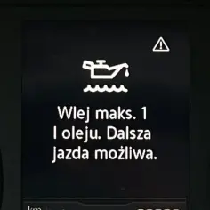 Na desce rozdzielczej świeci się kontrolka oleju z komunikatem "Wlej maks. 1 l oleju. Dalsza jazda możliwa.